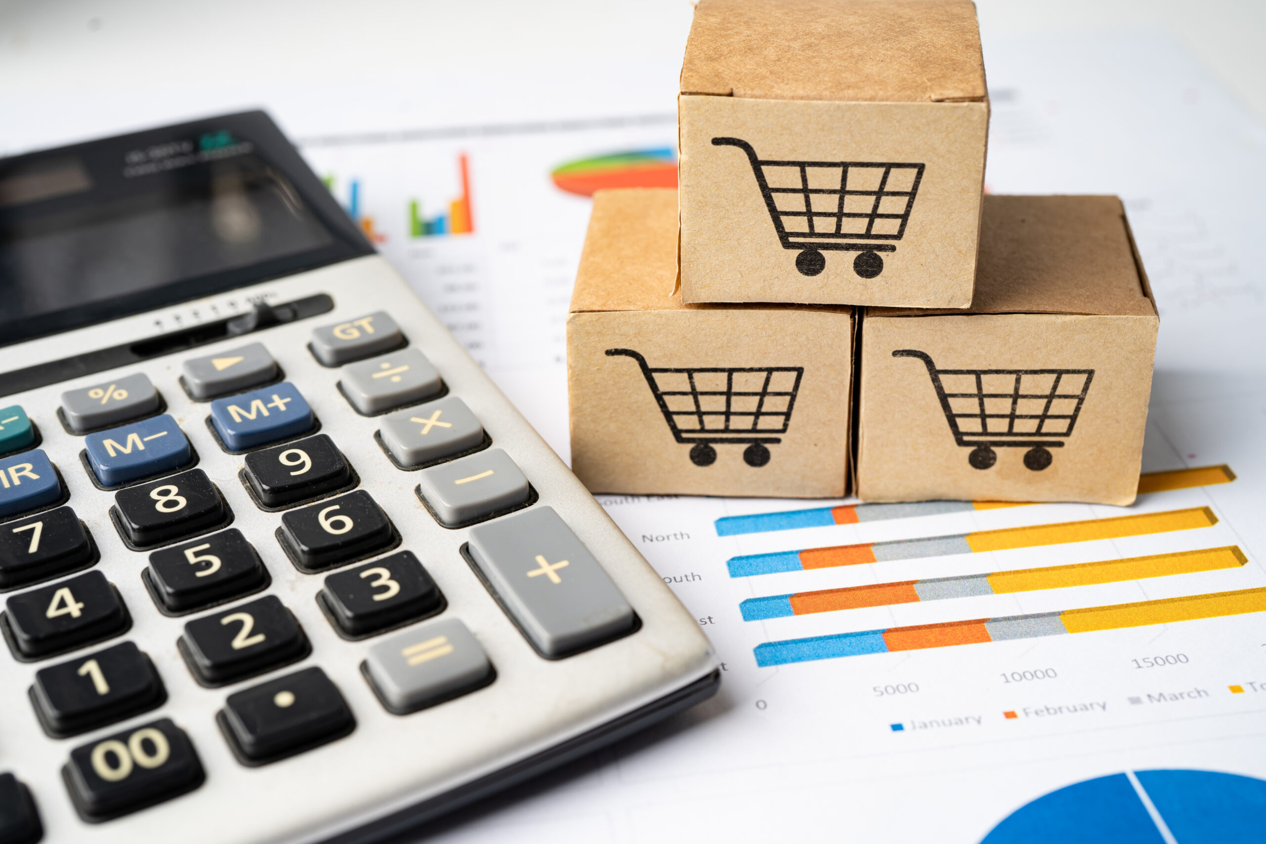 Shopping cart logo on box with magnifying glass on graph background. Banking Account, Investment Analytic research data economy, trading, Business import export transportation online company concept.